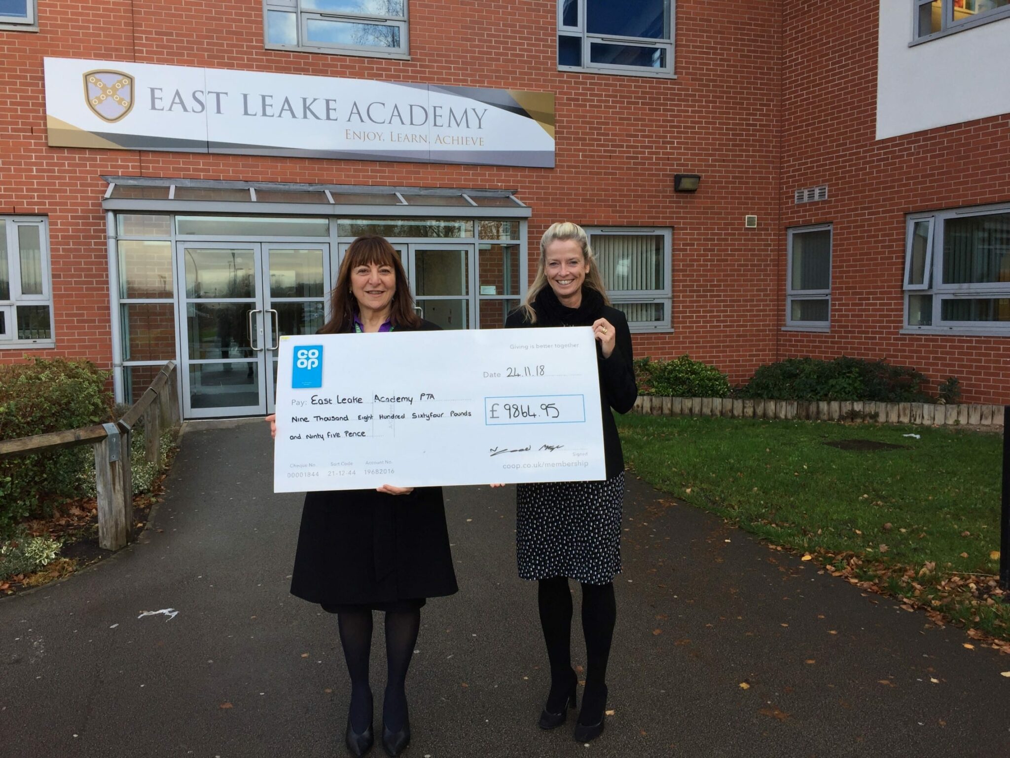 Coop East Leake presents cheque for £9,864 to the academy East Leake