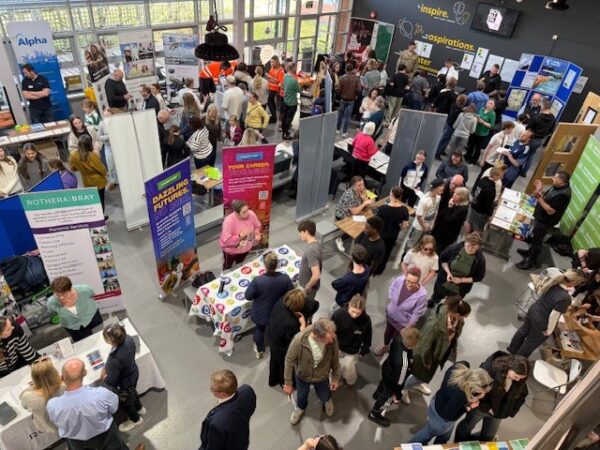 Students and exhibitors in a hall at East Leake Academy’s Careers Fair